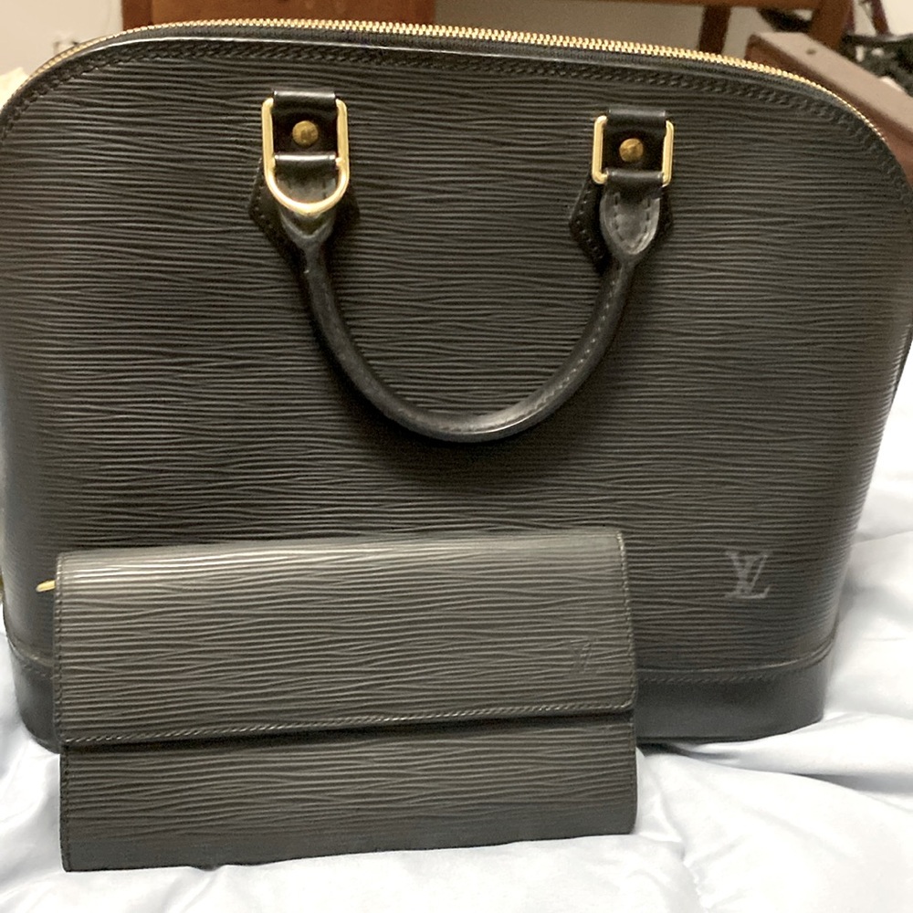 Louis Vuitton black leather Alma bag and matching wallet